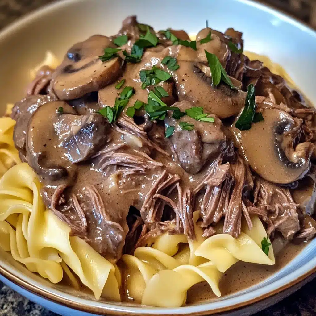 Slow cooker pot roast beef stroganoff with tender beef and creamy sauce.