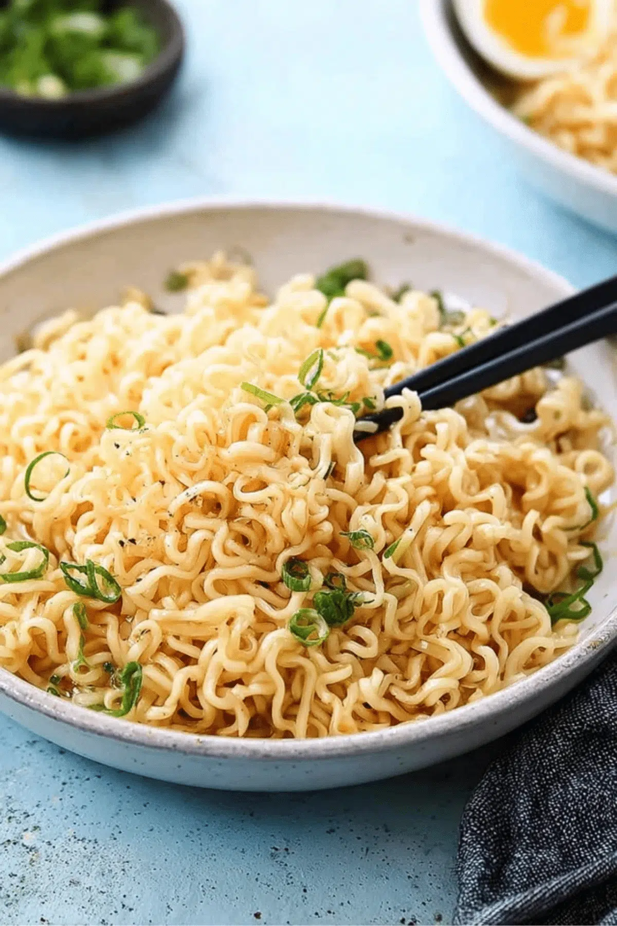 Flavorful garlic butter ramen noodles in a bowl.