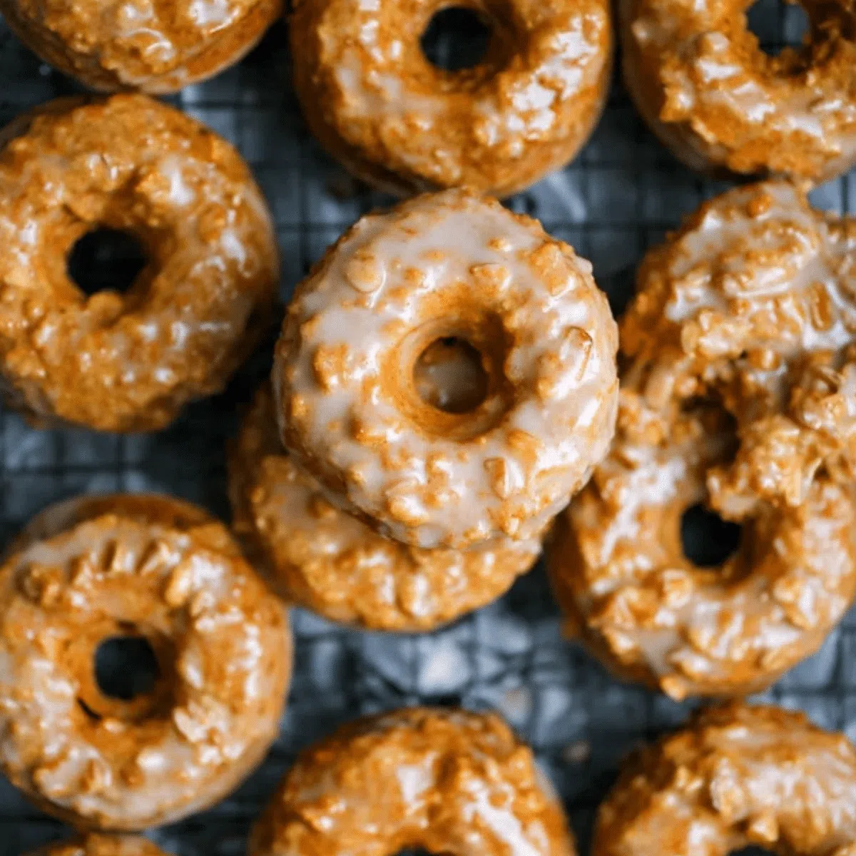Irresistible baked pumpkin donuts with sweet maple glaze.