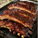 Tender Dr Pepper glazed ribs with a smoky, sweet sauce.