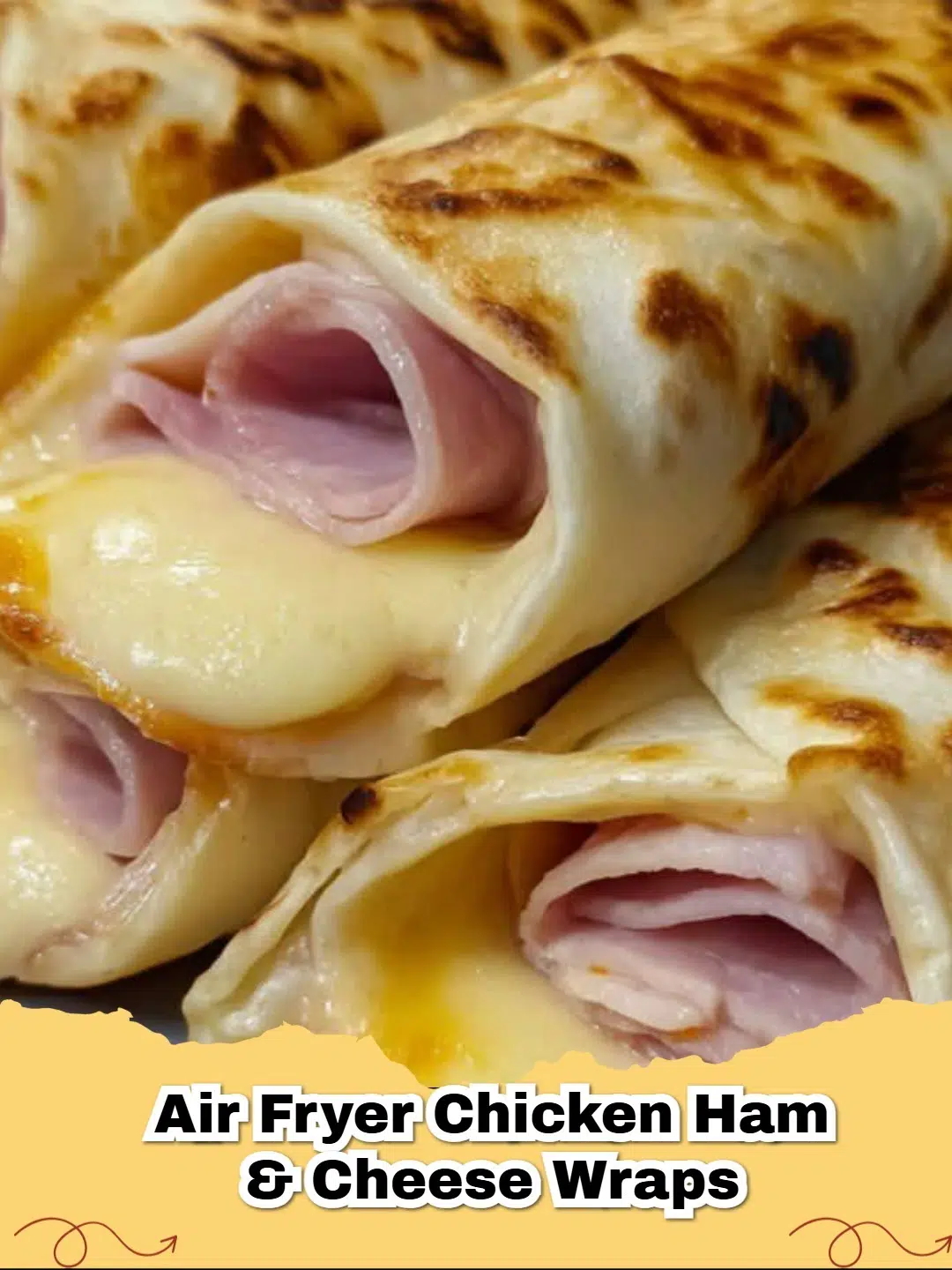 Crispy Air Fryer Chicken Ham and Cheese Wraps served on a plate with a side of dipping sauce