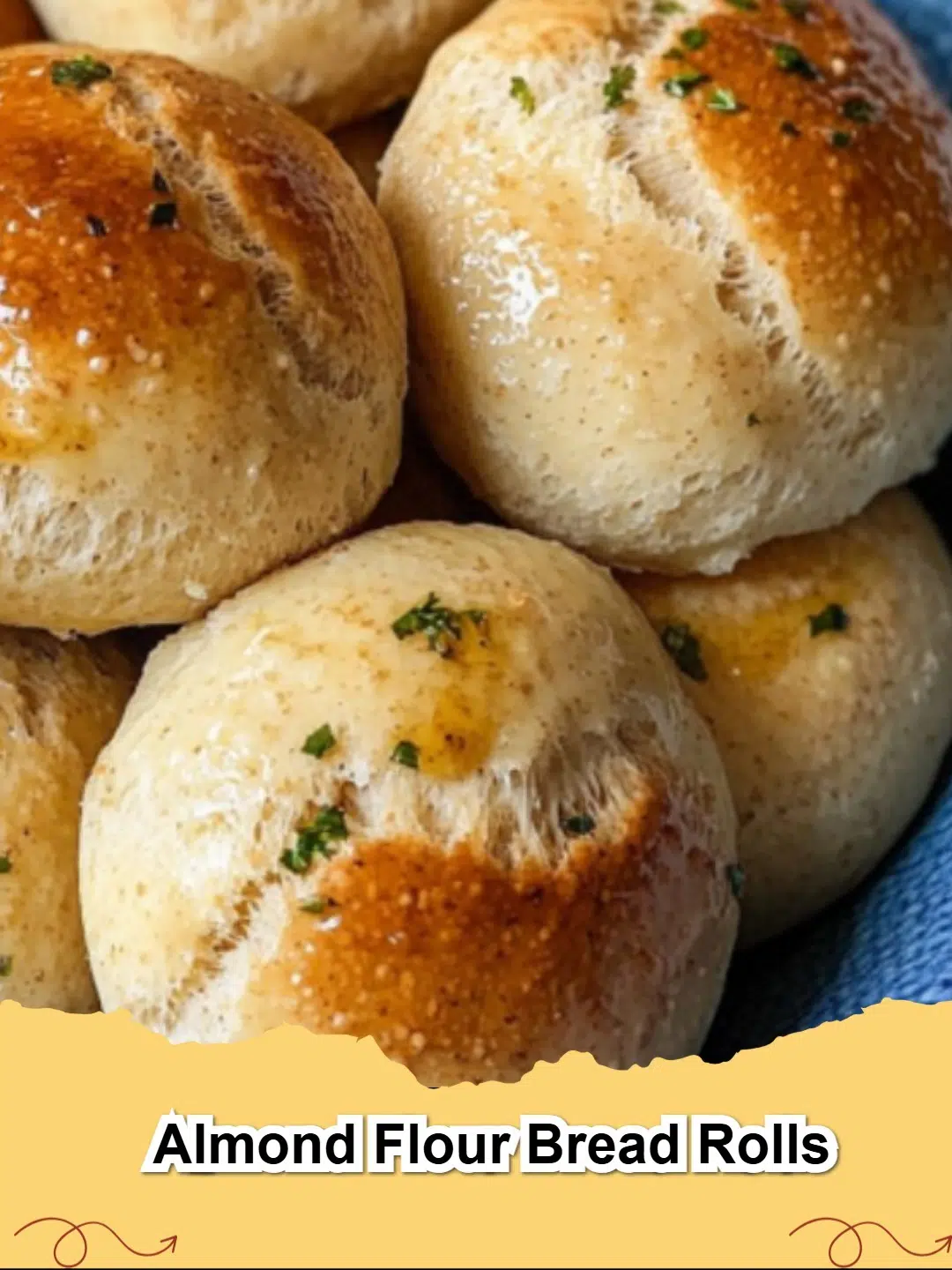 Golden brown Almond Flour Bread Rolls cooling on a wire rack, suitable for keto and gluten-free diets.