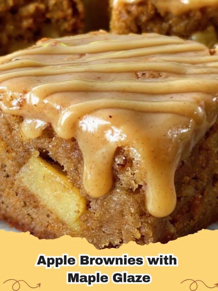 Close-up of freshly baked Apple Brownies with Maple Glaze, showing tender apple pieces and a sweet, drizzled topping, ready to serve.