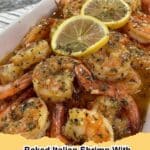 Platter of delicious Baked Italian Shrimp with Lemon, garnished with fresh parsley and lemon slices.