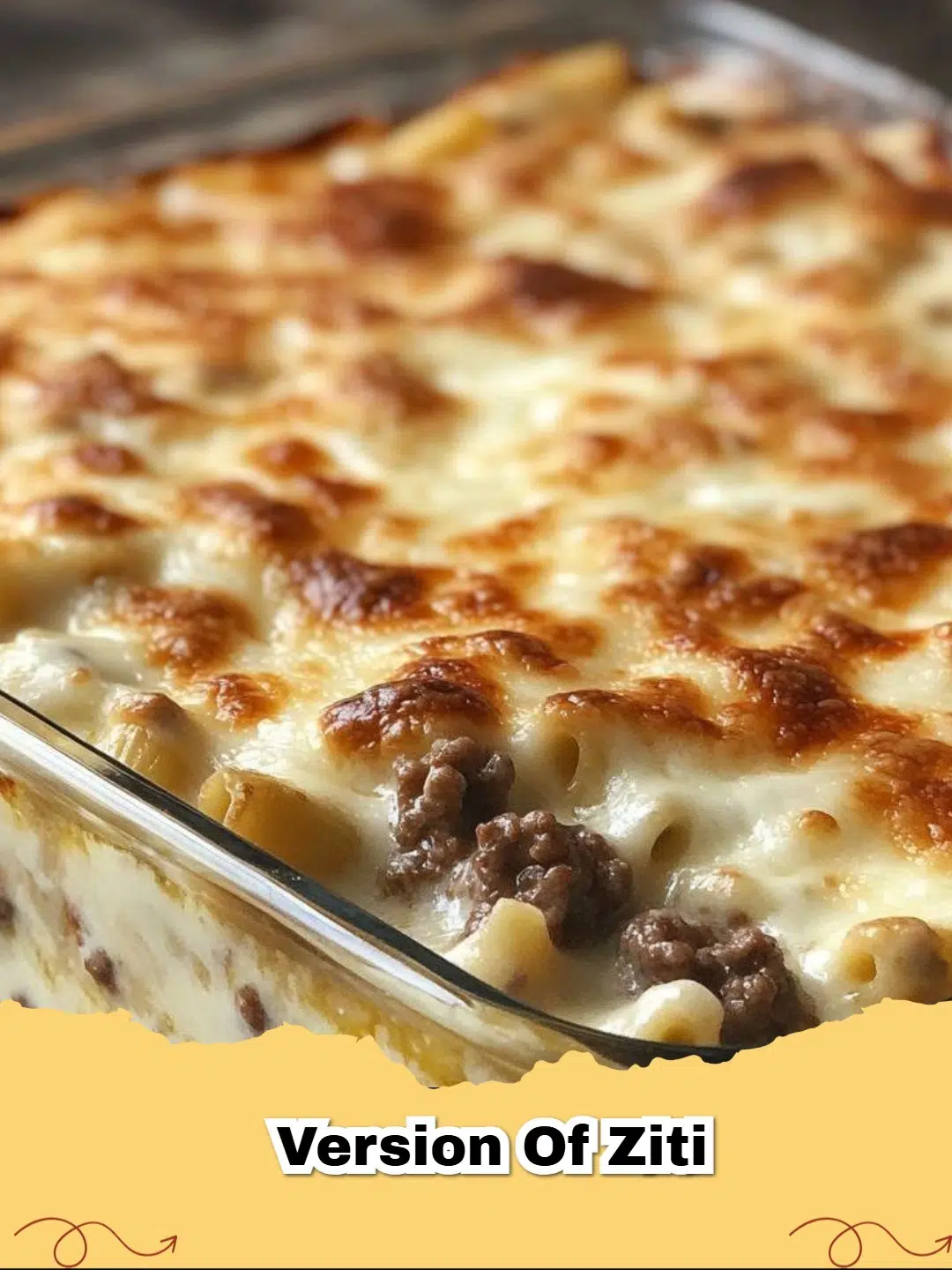 A close-up shot of a bubbling Beef Alfredo Ziti Casserole fresh out of the oven, topped with golden melted cheese and garnished with fresh parsley.