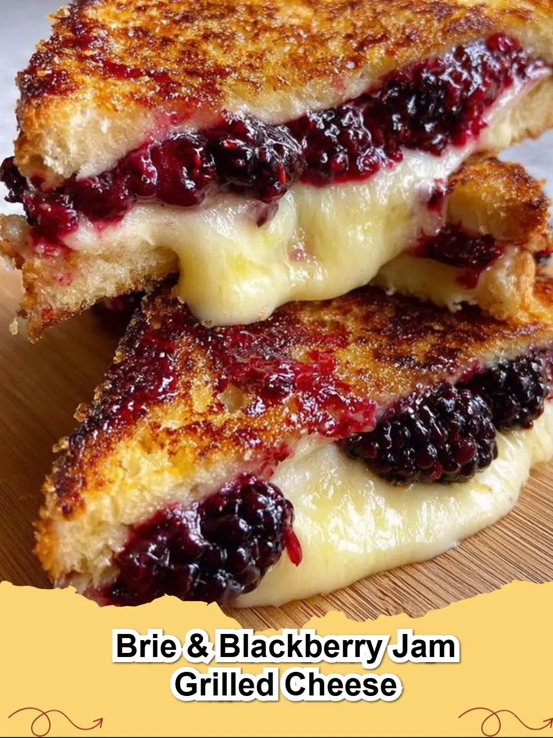 Delicious Brie and Blackberry Jam Grilled Cheese sandwich, golden brown and oozing with melted brie and sweet jam.