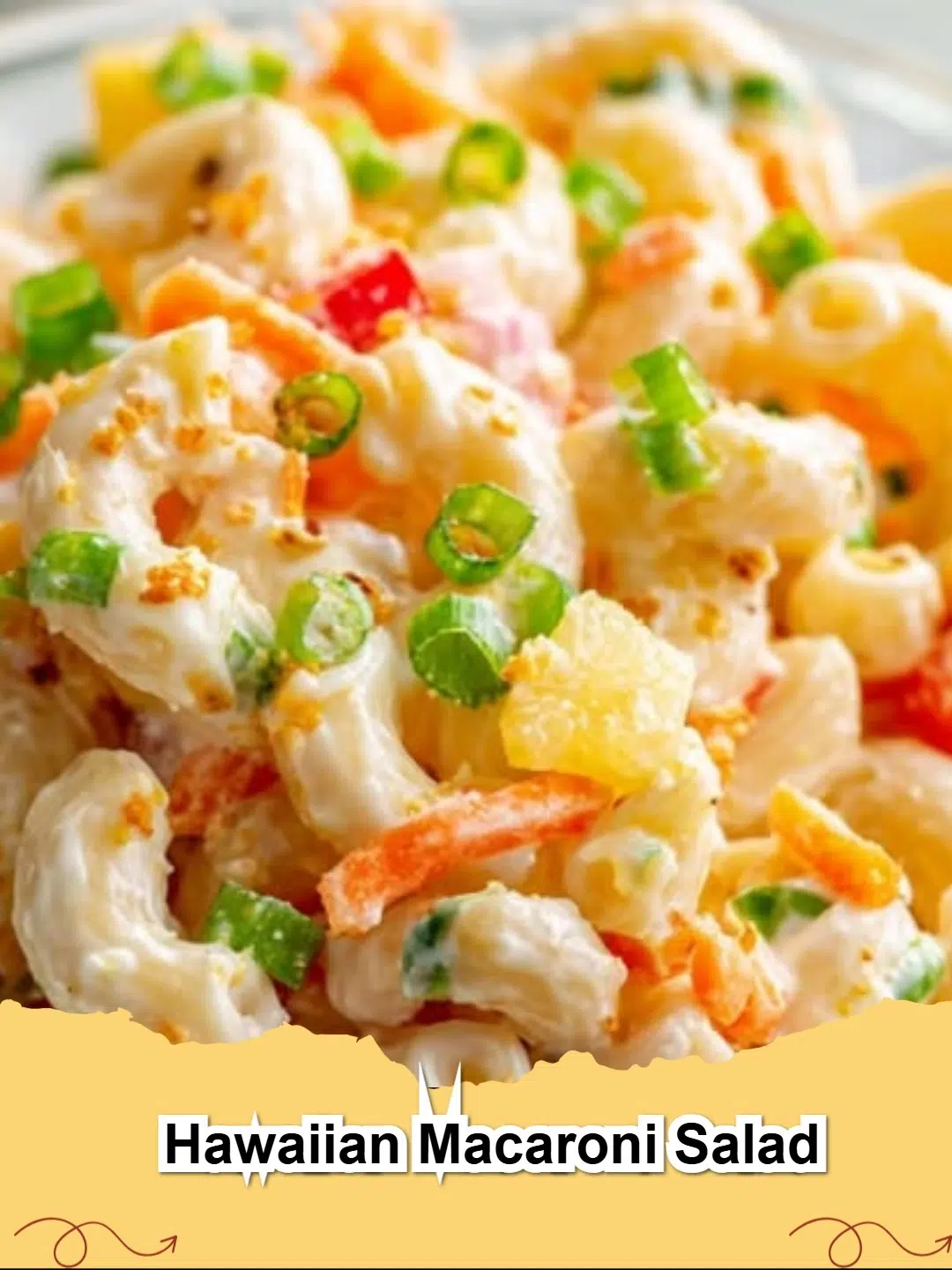 Creamy Hawaiian Macaroni Salad in a large bowl, garnished with green onions, ready to serve at a barbecue.