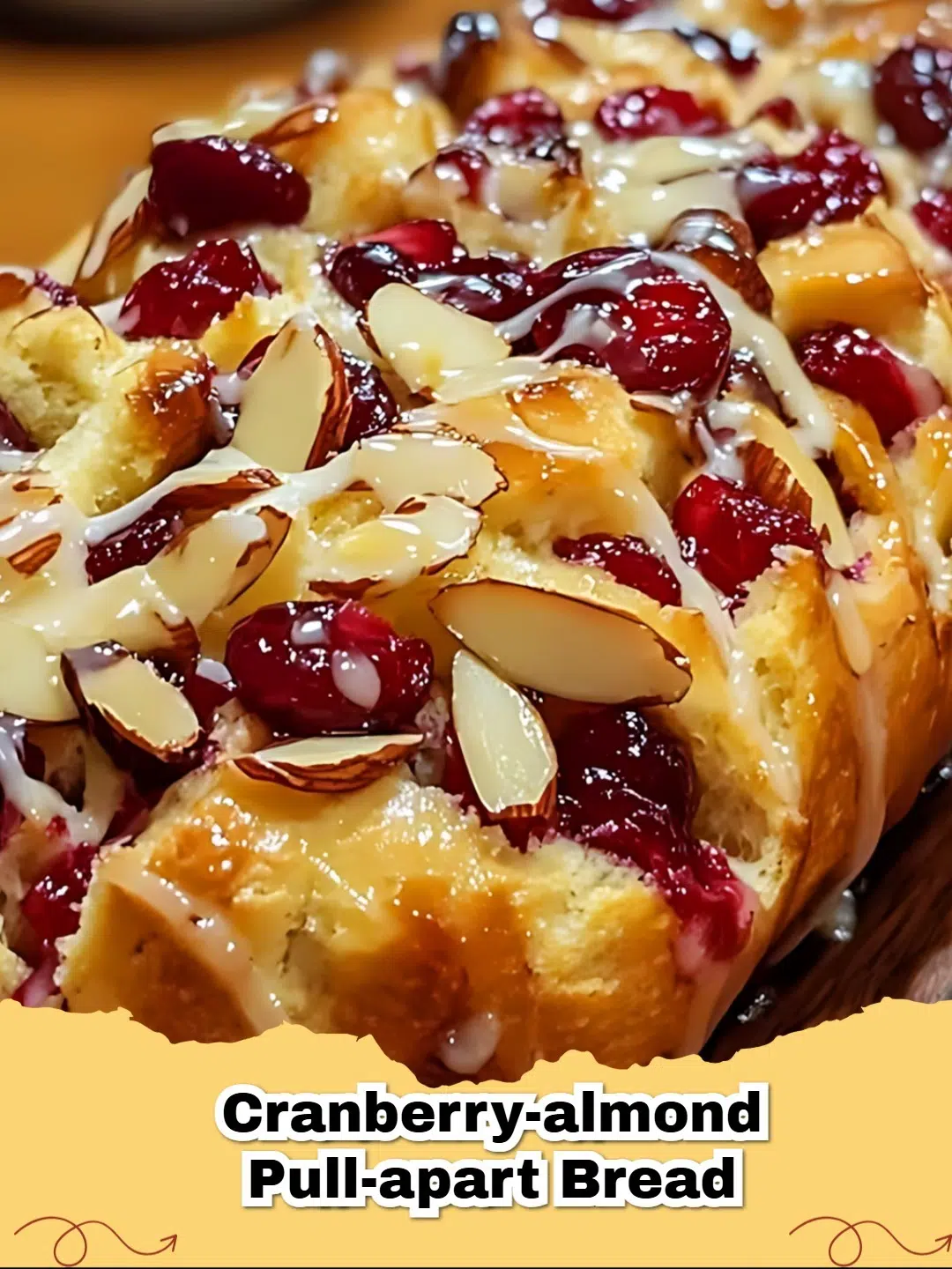 Delicious Cranberry-Almond Pull-Apart Bread with a honey glaze, perfect for breakfast or dessert.