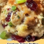 Platter of golden brown Cranberry Turkey Stuffing Balls garnished with fresh parsley.