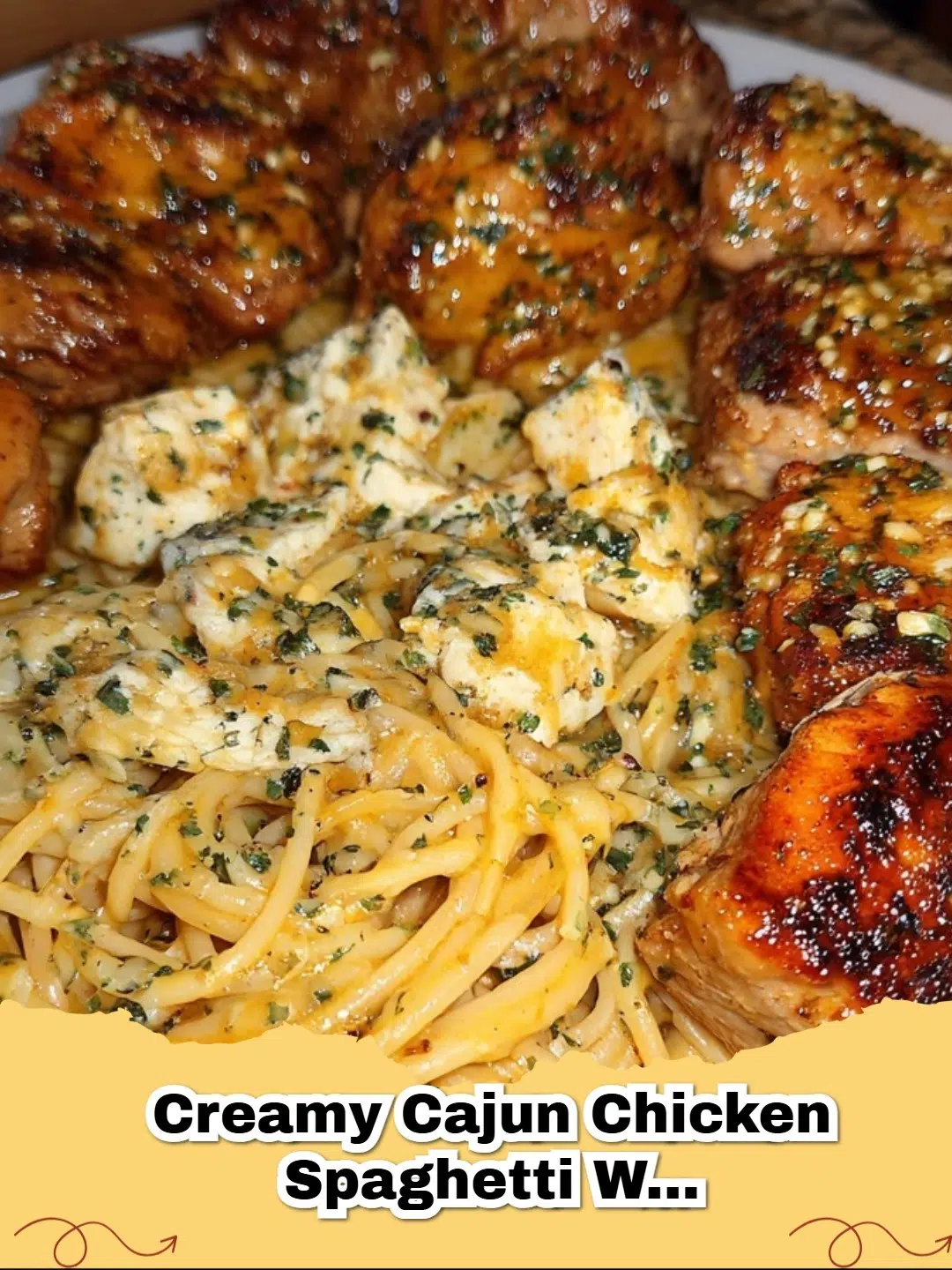 Creamy Cajun Chicken Spaghetti with Mozzarella Velveeta Alfredo Sauce served in a bowl, garnished with fresh parsley.