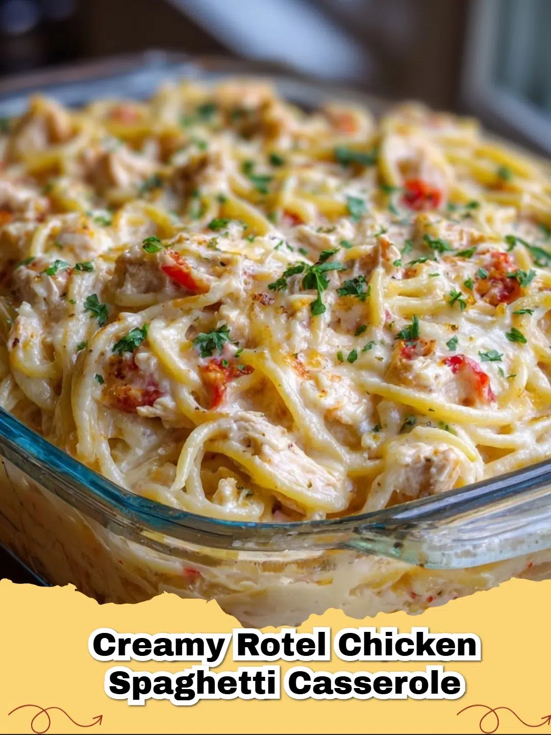 A close-up shot of a bubbling Creamy Rotel Chicken Spaghetti Casserole with melted cheese on top, ready to be served.