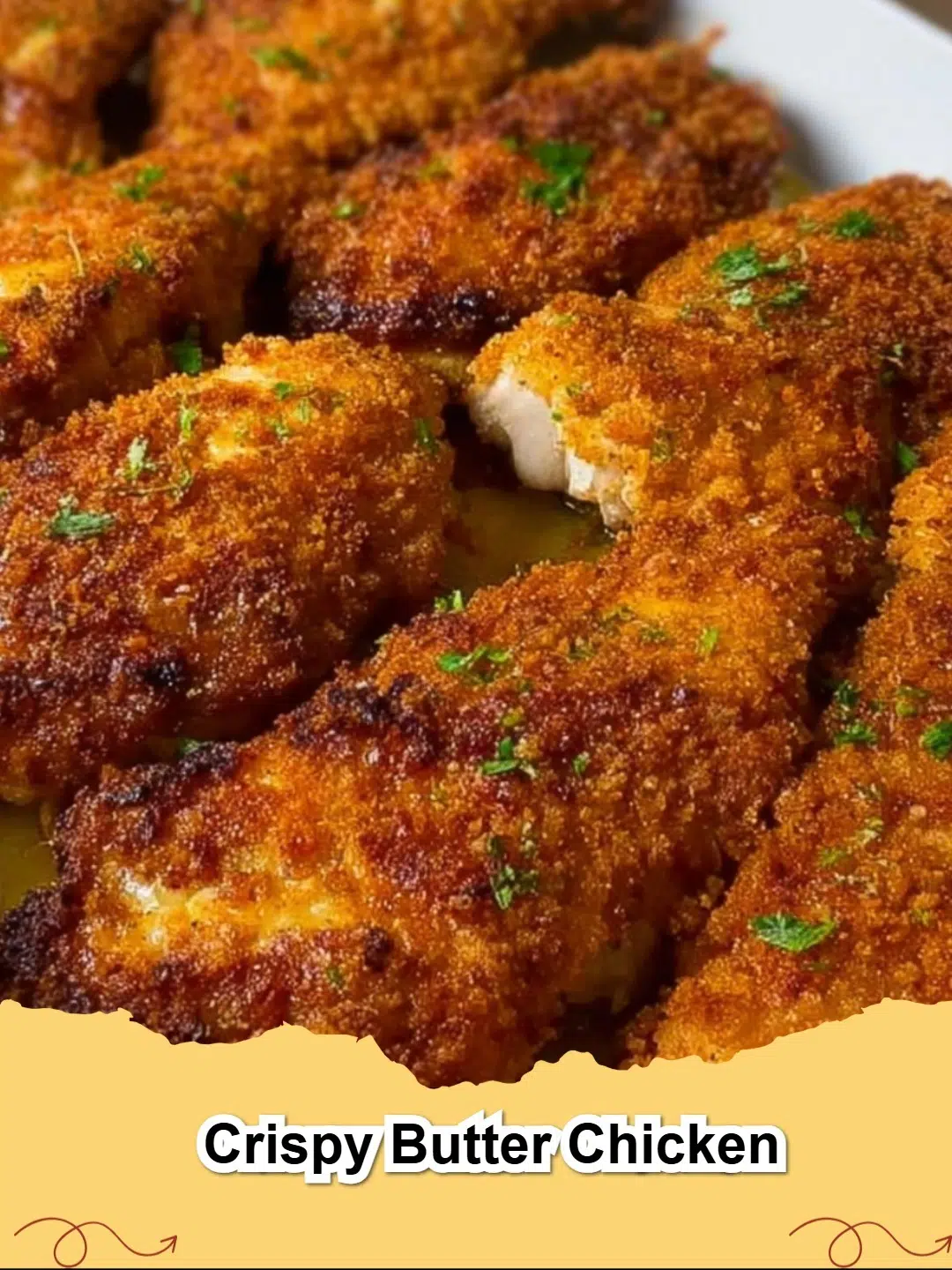 Golden-brown Crispy Butter Chicken with a crunchy Ritz cracker crust on a plate.