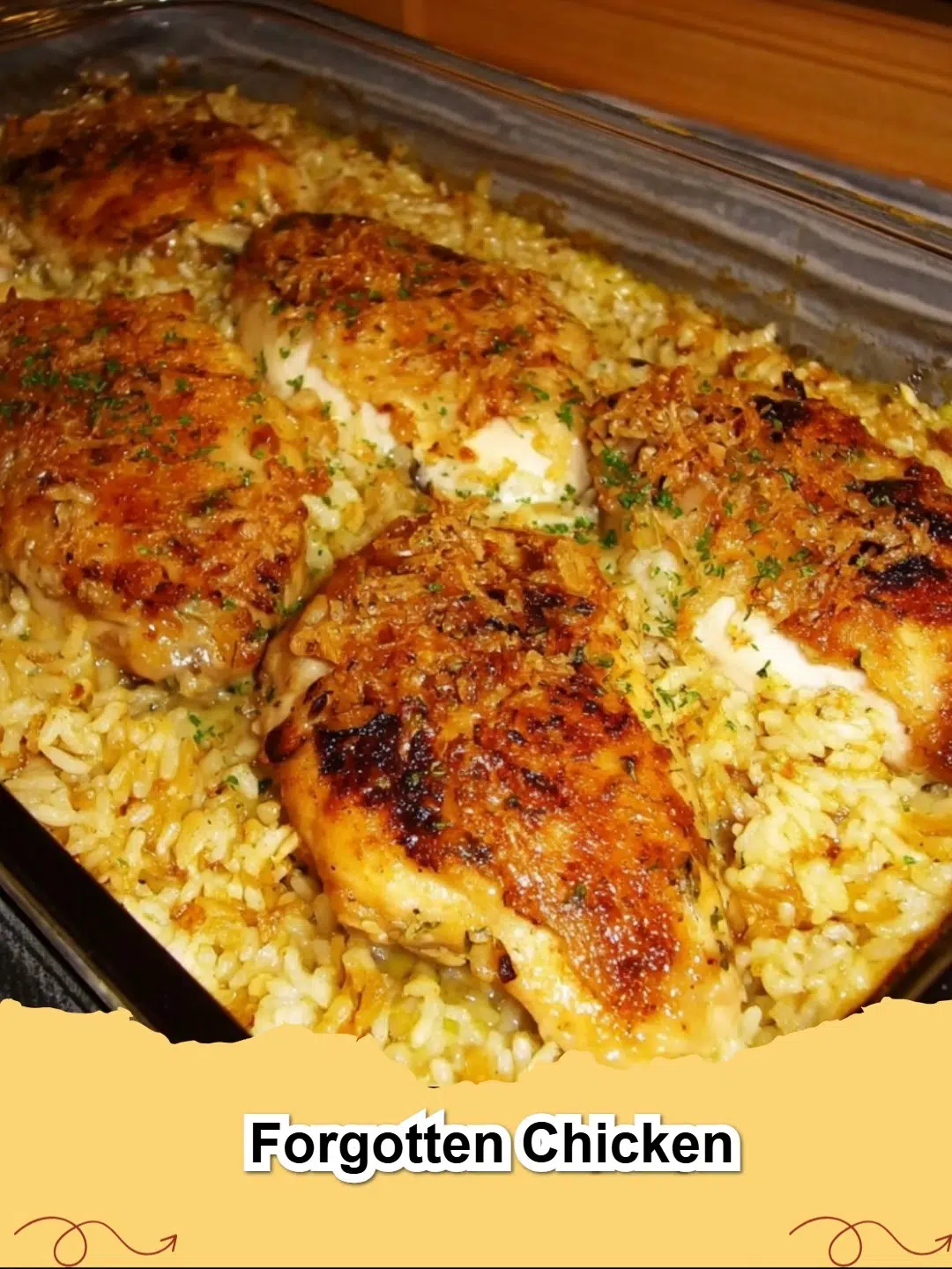 Close-up of a golden brown Easy Forgotten Chicken with Rice Casserole in a baking dish, with steam rising.