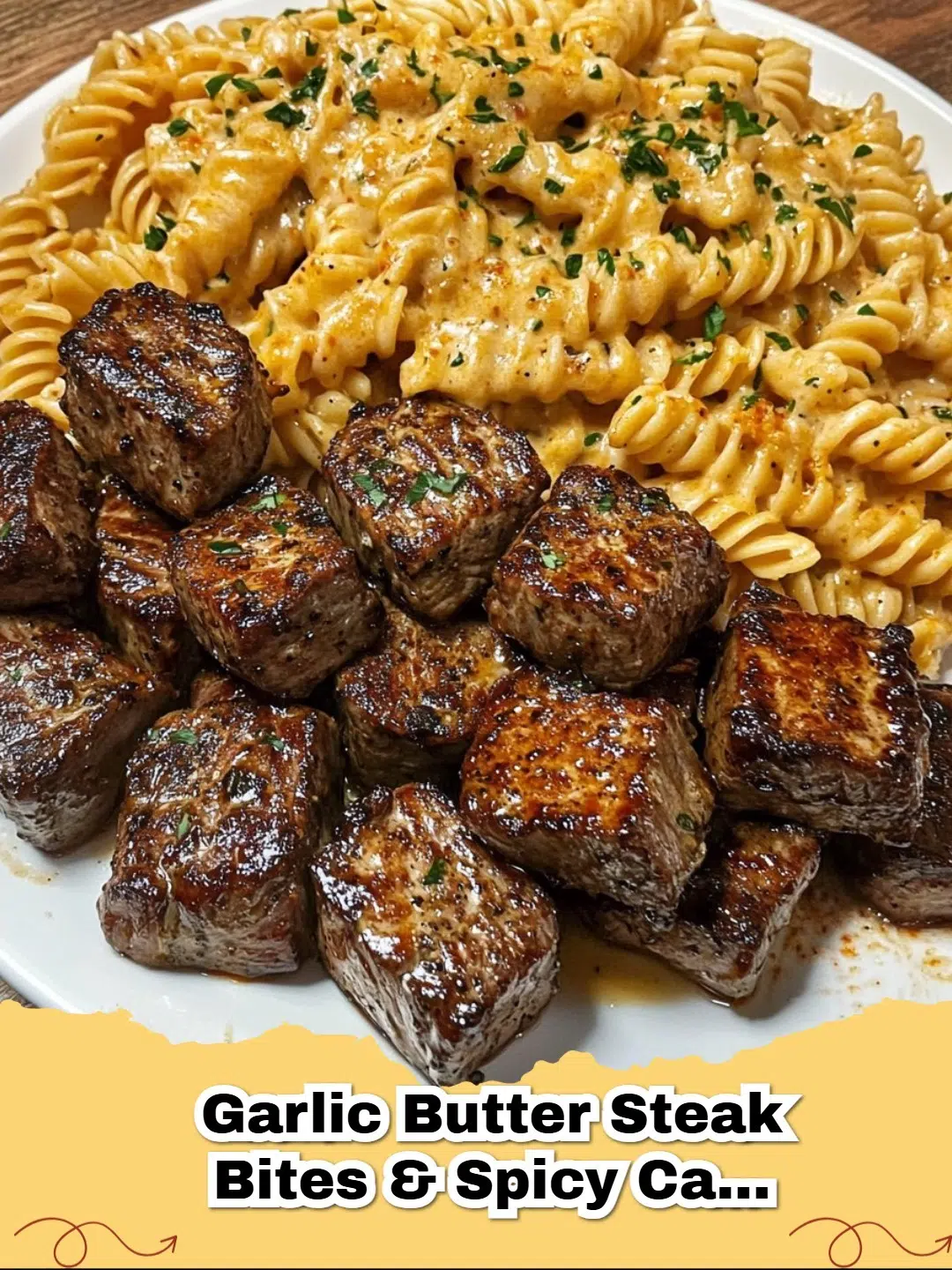 Garlic Butter Steak Bites and Spicy Cajun Alfredo Twisted Pasta served in a bowl, garnished with fresh parsley.