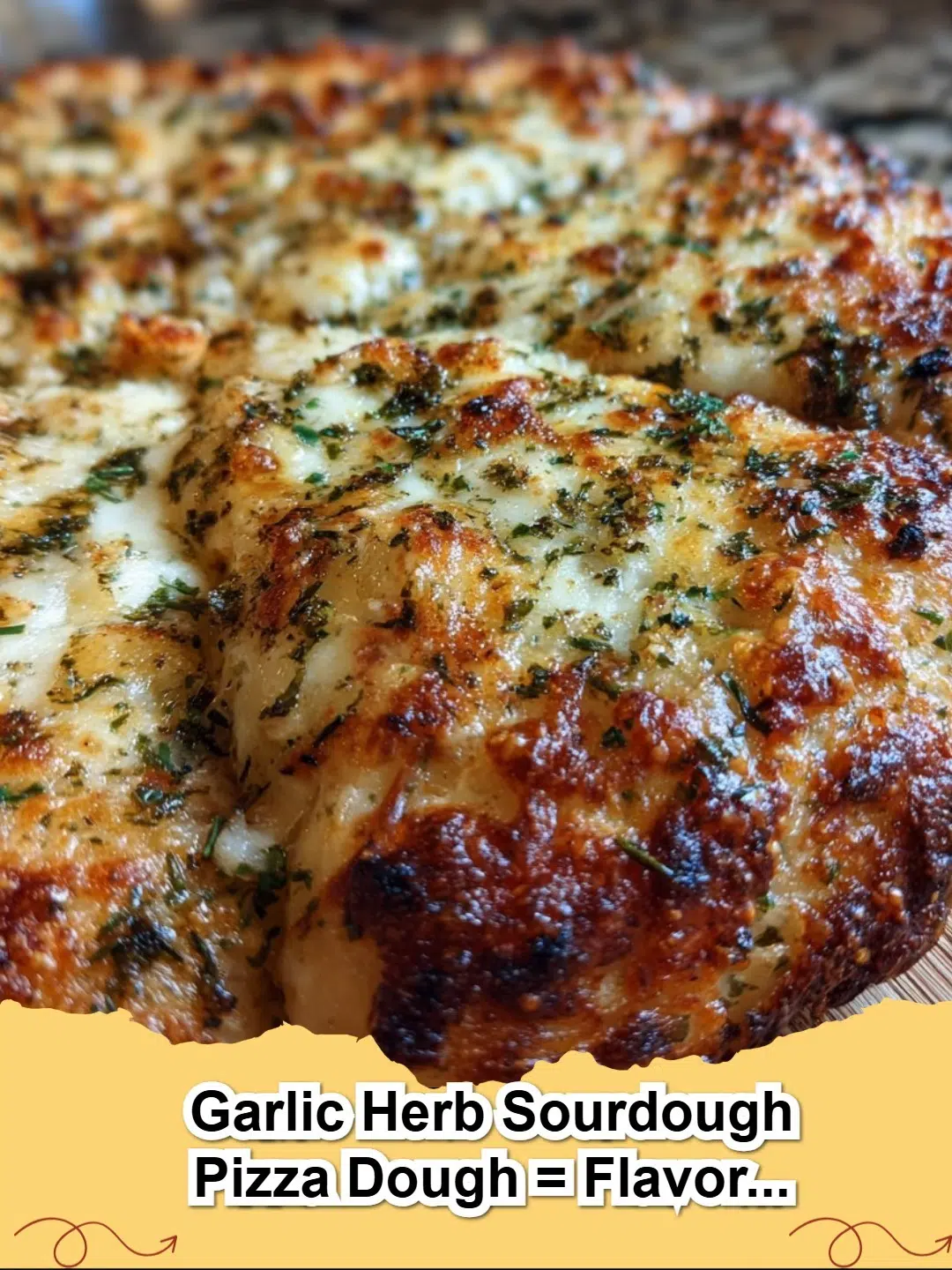 Freshly mixed Garlic Herb Sourdough Pizza Dough rising in a bowl, ready for homemade pizza night.