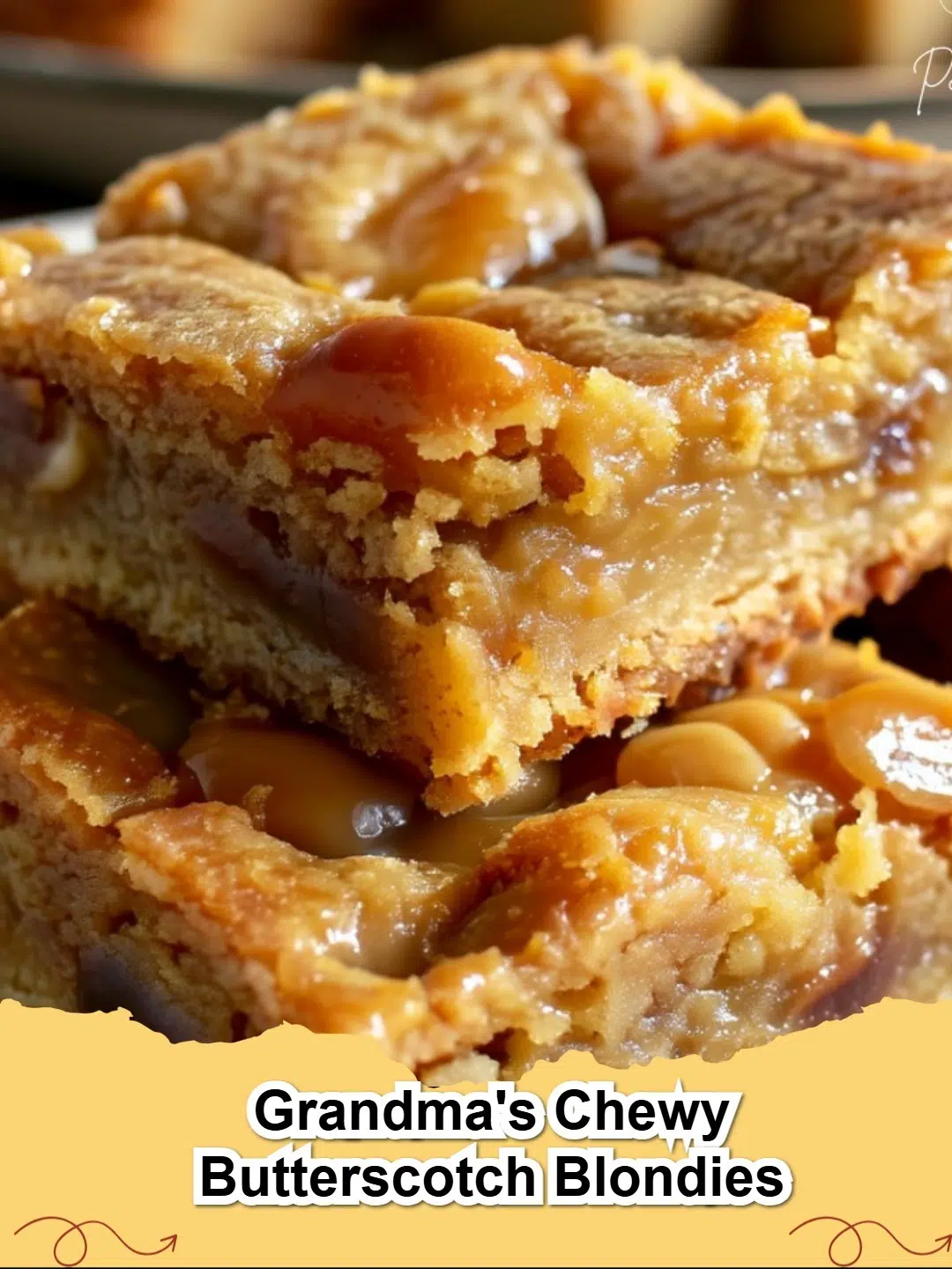 A batch of warm, chewy butterscotch blondies cut into squares, showing melted butterscotch chips and a golden-brown crust.