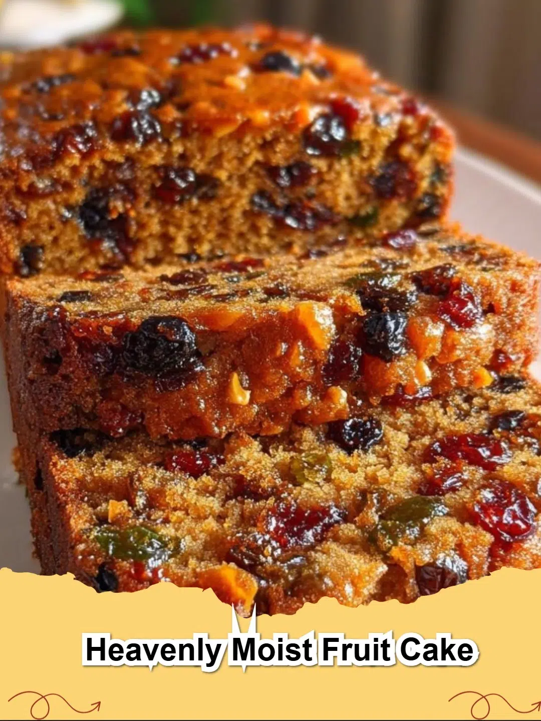 Slice of Heavenly Moist Fruit Cake on a plate