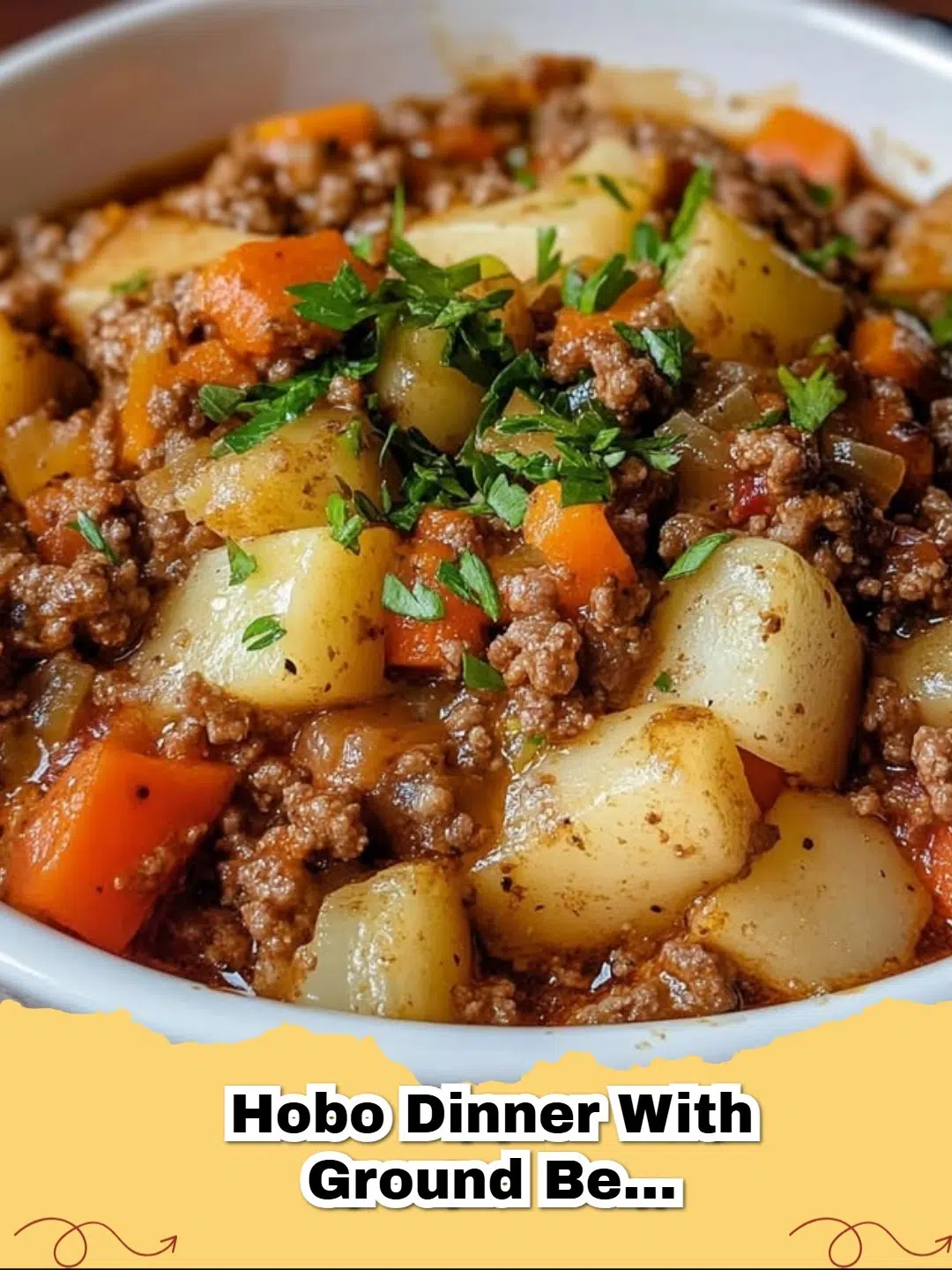 Close-up of a steaming Hobo Dinner in a foil packet with ground beef, potatoes, and vegetables, cooked and ready to eat.