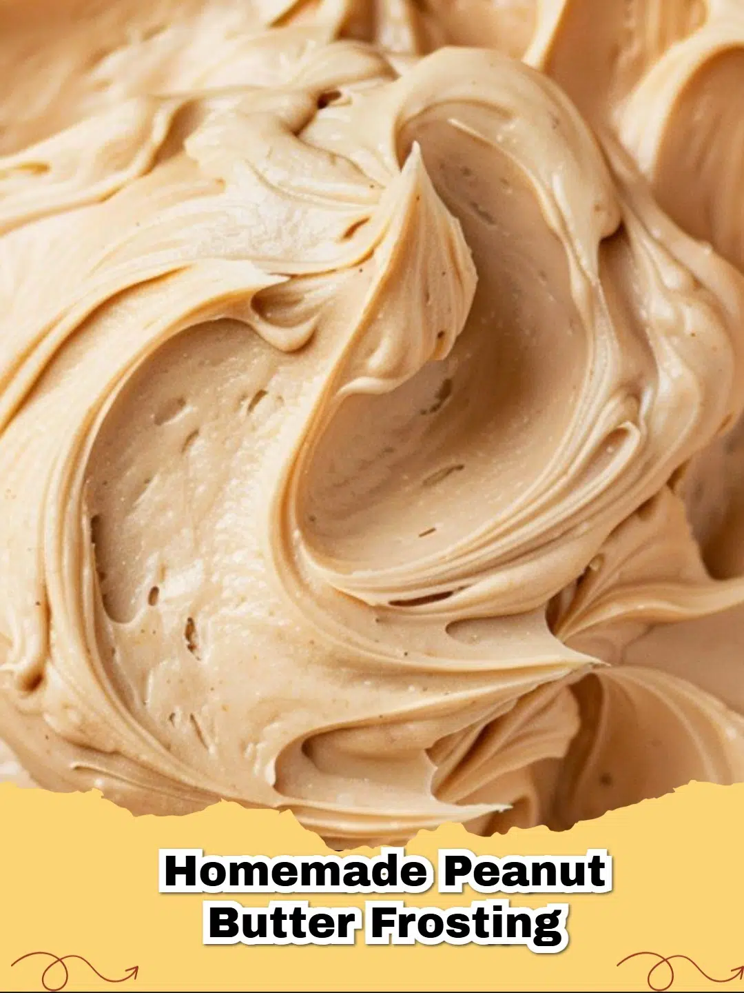 Creamy Homemade Peanut Butter Frosting swirled on top of chocolate cupcakes, with a sprinkle of chopped peanuts.