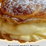 Golden brown Italian Cream Puffs filled with sweet vanilla custard, dusted with powdered sugar, on a white plate.