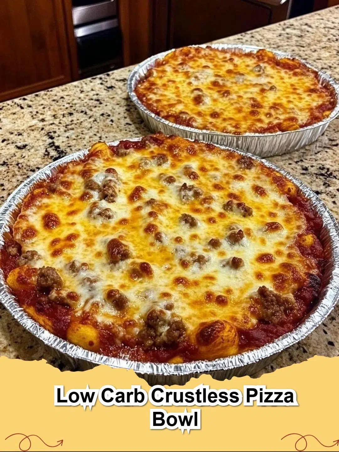 A delicious, bubbling Low Carb Crustless Pizza Bowl topped with melted mozzarella, pepperoni, and sausage.