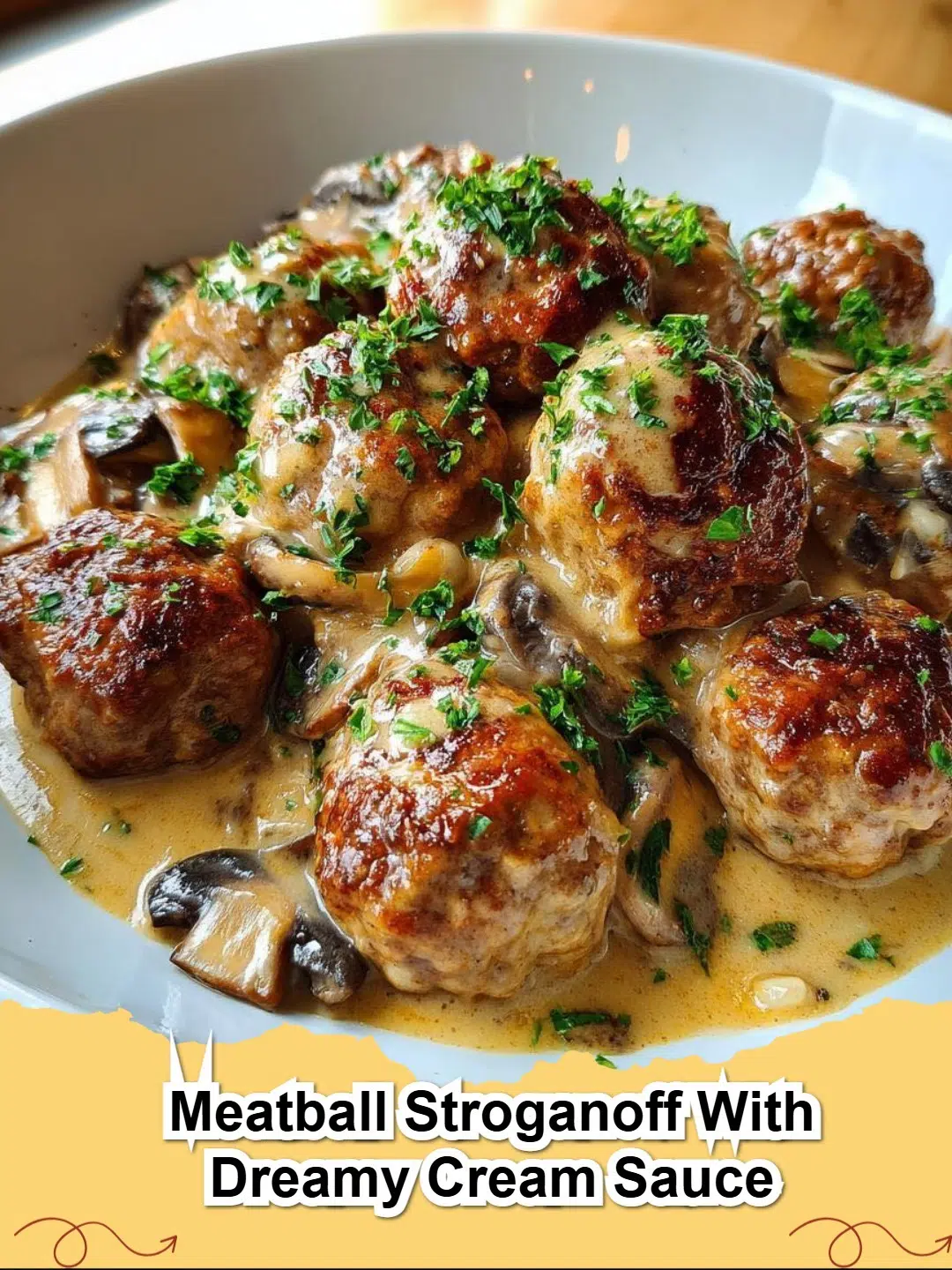 Delicious Meatball Stroganoff with Dreamy Cream Sauce served over egg noodles, garnished with fresh parsley.