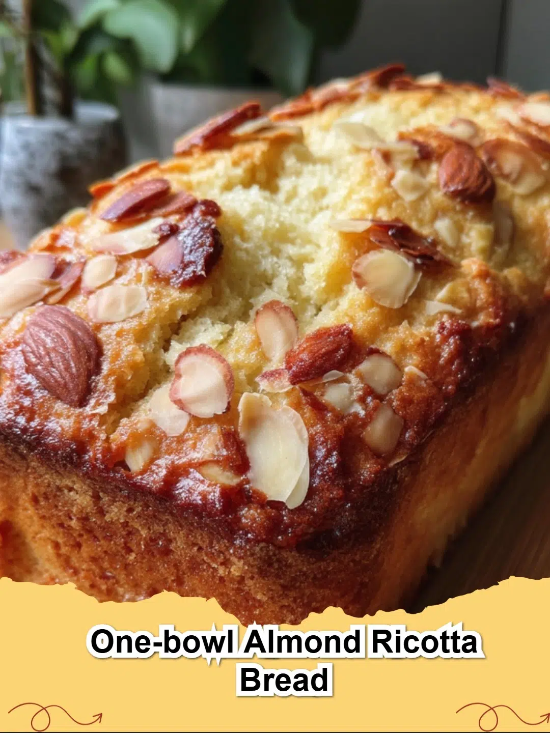 Delicious slice of One-Bowl Almond Ricotta Bread with a golden crust and sliced almonds