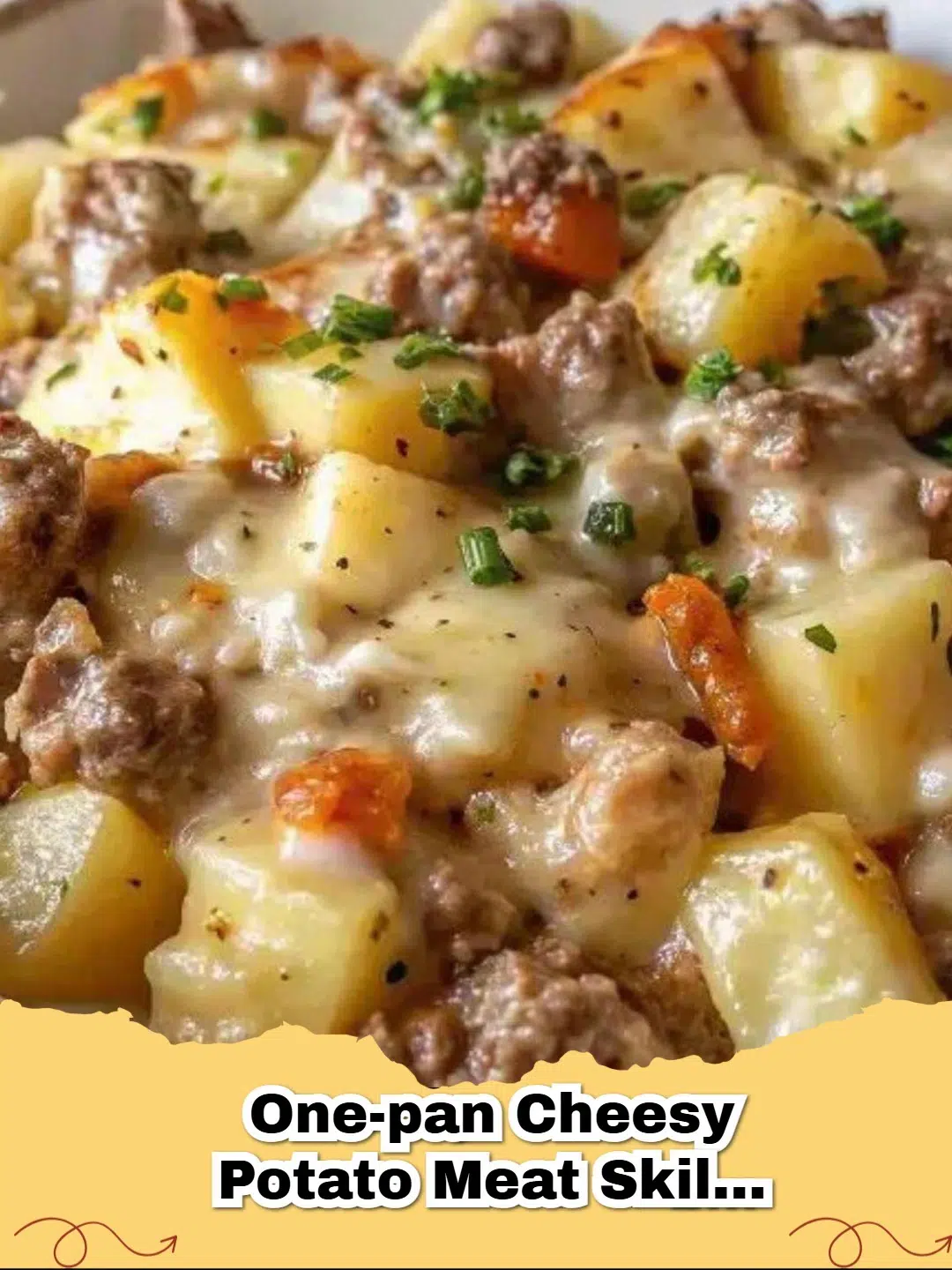 A close-up of a sizzling One-Pan Cheesy Potato Meat Skillet topped with melted cheese and fresh parsley.