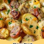 One-Pan Cheesy Ranch Potatoes and Smoked Sausage skillet, golden brown and topped with melted cheddar cheese and fresh parsley.