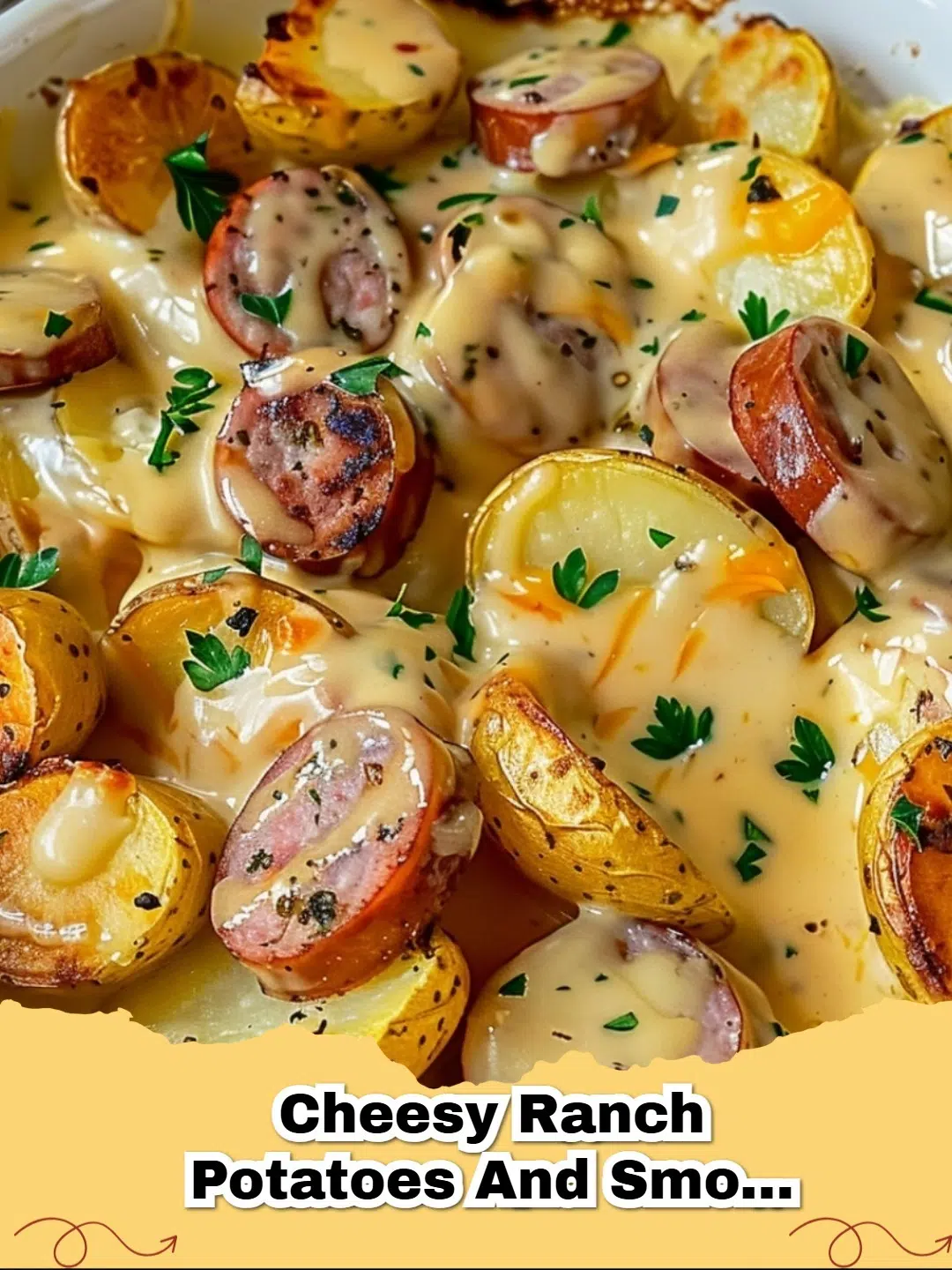 One-Pan Cheesy Ranch Potatoes and Smoked Sausage skillet, golden brown and topped with melted cheddar cheese and fresh parsley.