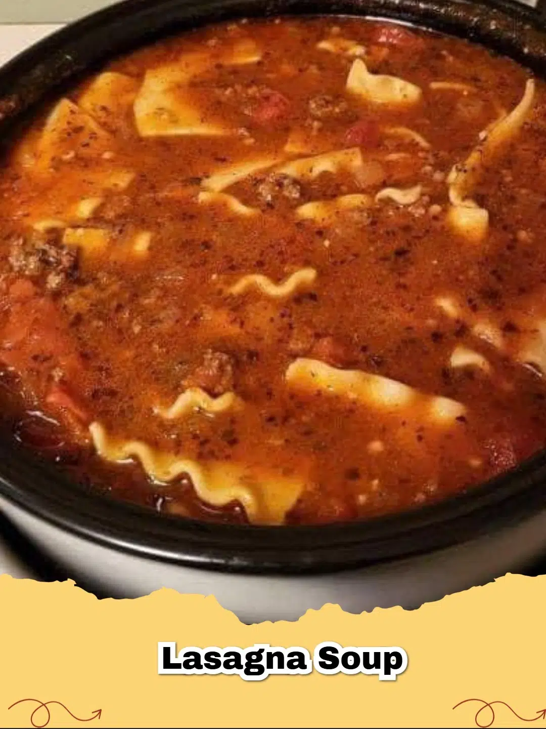 A close-up of a steaming bowl of hearty Lasagna Soup, garnished with creamy ricotta, melted mozzarella, and fresh parsley, ready to eat.