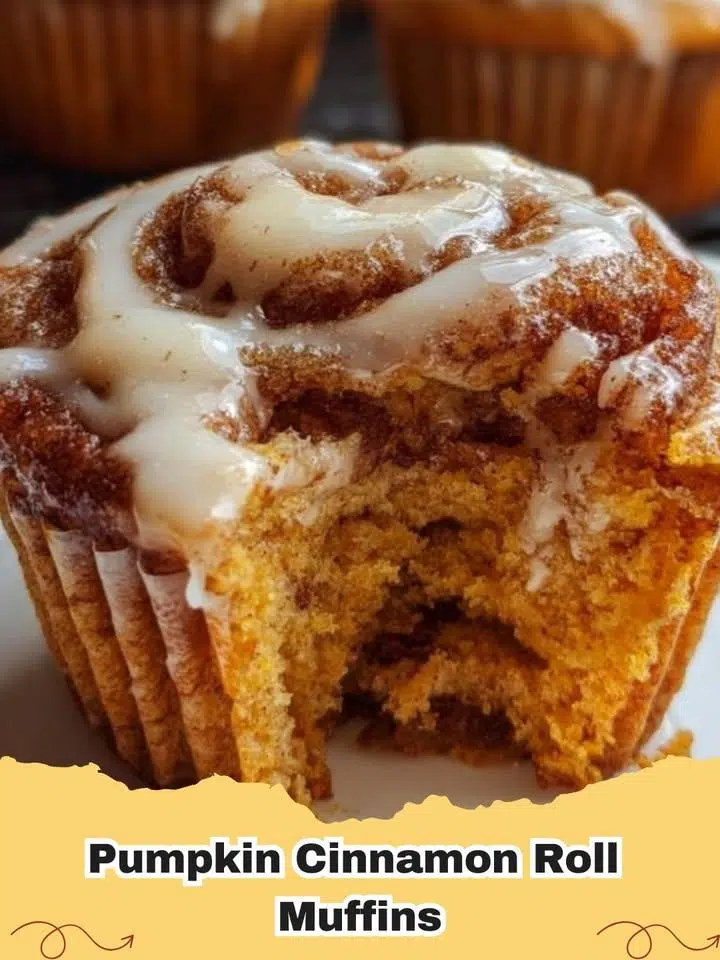 Close-up of freshly baked Pumpkin Cinnamon Roll Muffins drizzled with cream cheese glaze, perfect for a fall breakfast.