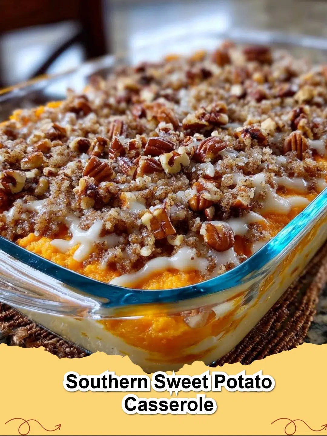Creamy Southern Sweet Potato Casserole with a golden-brown pecan streusel topping in a white baking dish, ready to serve.