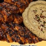 Pan-seared Sticky Honey Butter Salmon with a side of creamy chili sauce and fresh herbs, ready to be served.