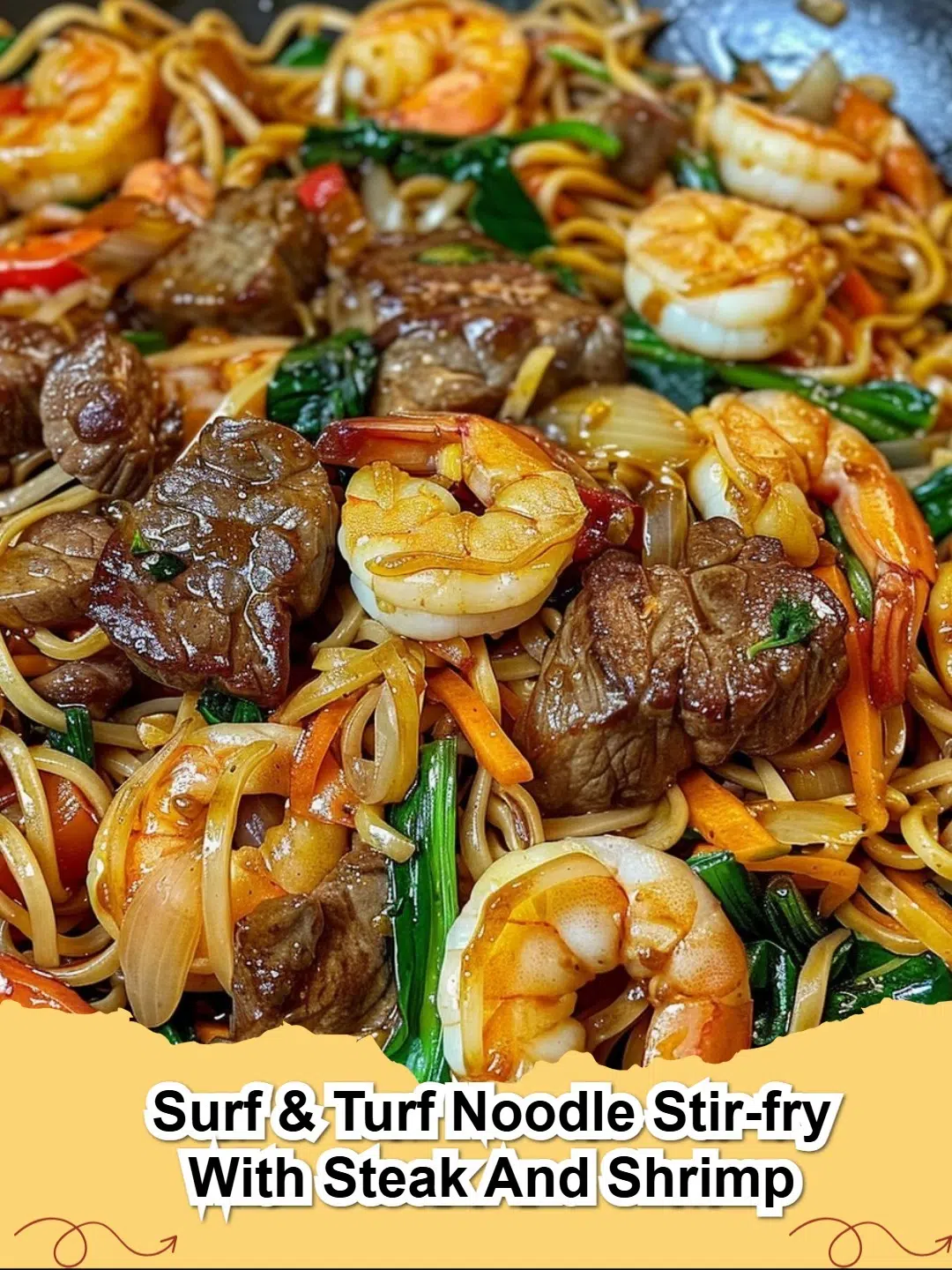 Platter of Surf & Turf Noodle Stir-Fry with Steak and Shrimp garnished with sesame seeds and green onions