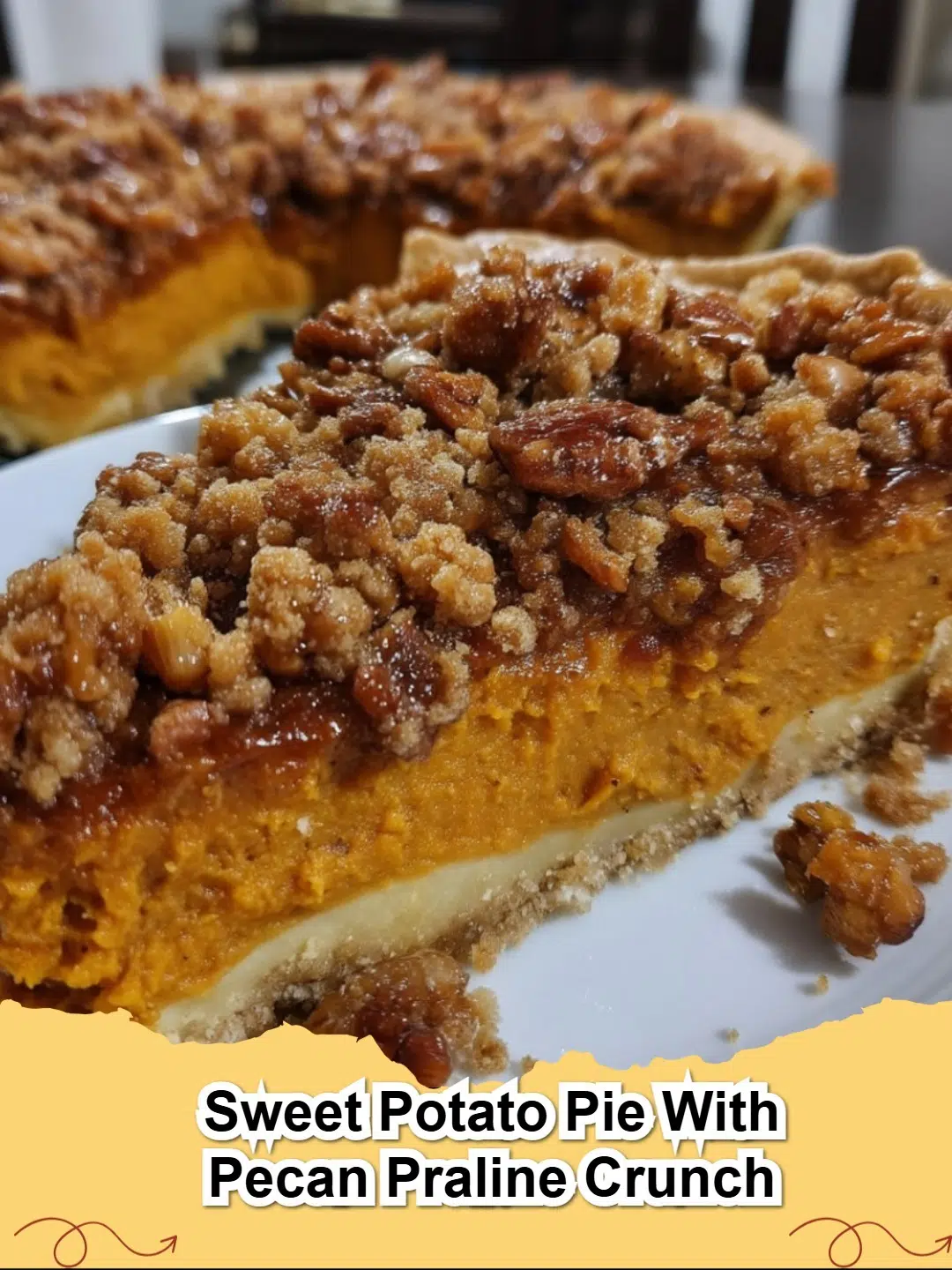 Sweet Potato Pie with Pecan Praline Crunch, sliced and ready to serve, showing the creamy filling and crunchy topping.