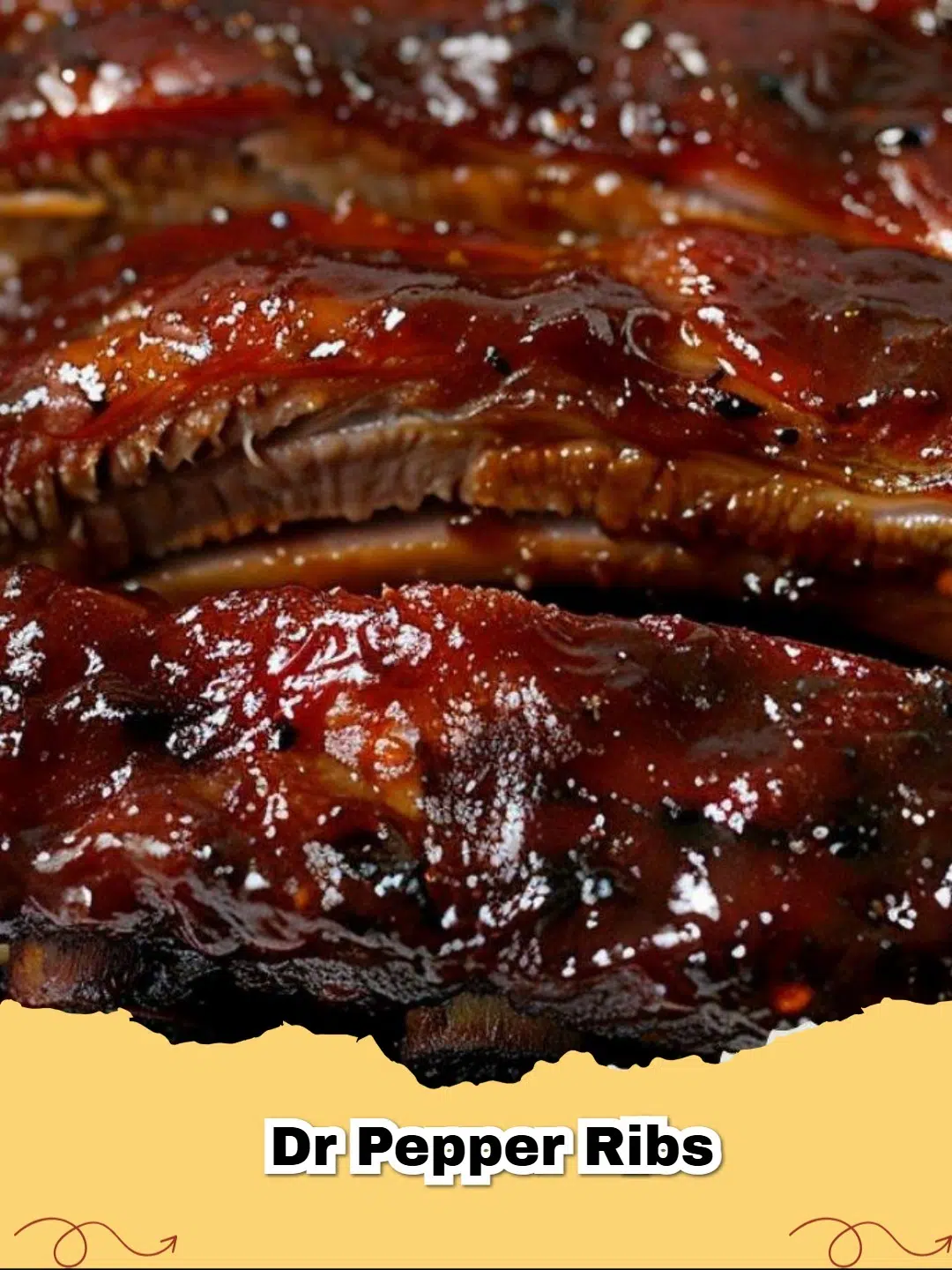 Tender, sticky Dr Pepper Ribs piled on a serving platter, glazed to perfection with a hint of smoke.