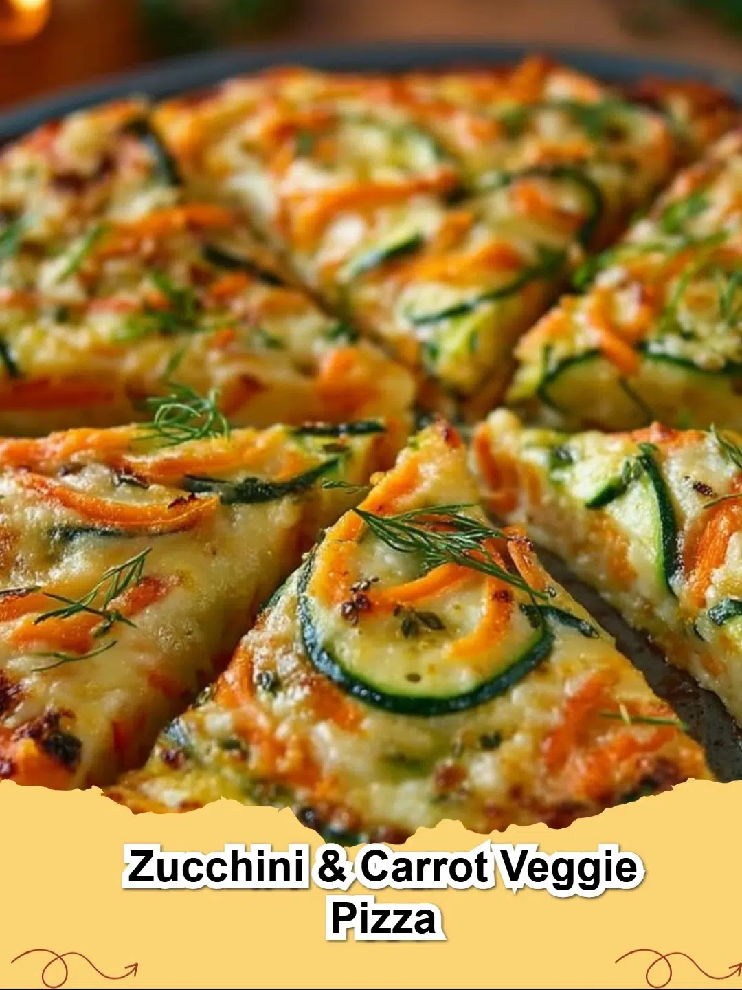 A close-up of a freshly baked Zucchini & Carrot Veggie Pizza, featuring colorful spirals of zucchini and carrots on a cheesy crust.