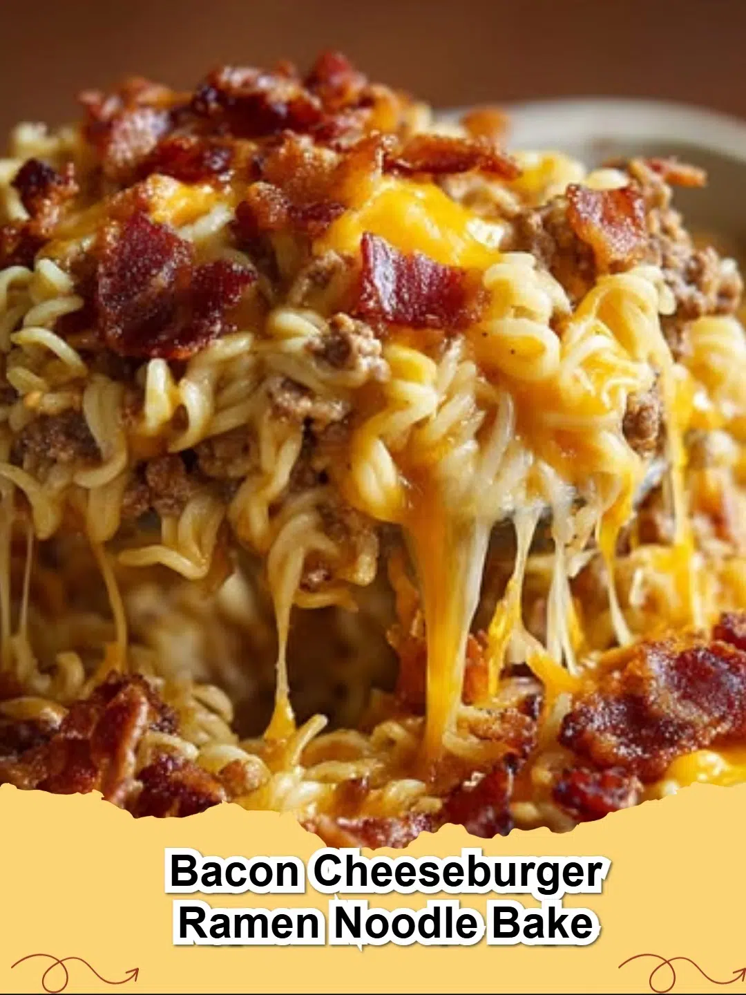 Delicious Bacon Cheeseburger Ramen Noodle Bake in a casserole dish, topped with melted cheese and crispy bacon.