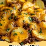 Close-up of a skillet filled with bubbling Cheesy Ground Beef and Potatoes, topped with melted cheddar cheese and fresh parsley.