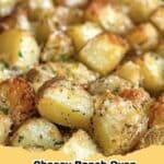 Cheesy Ranch Oven Roasted Potatoes, golden brown and perfectly seasoned on a baking sheet.