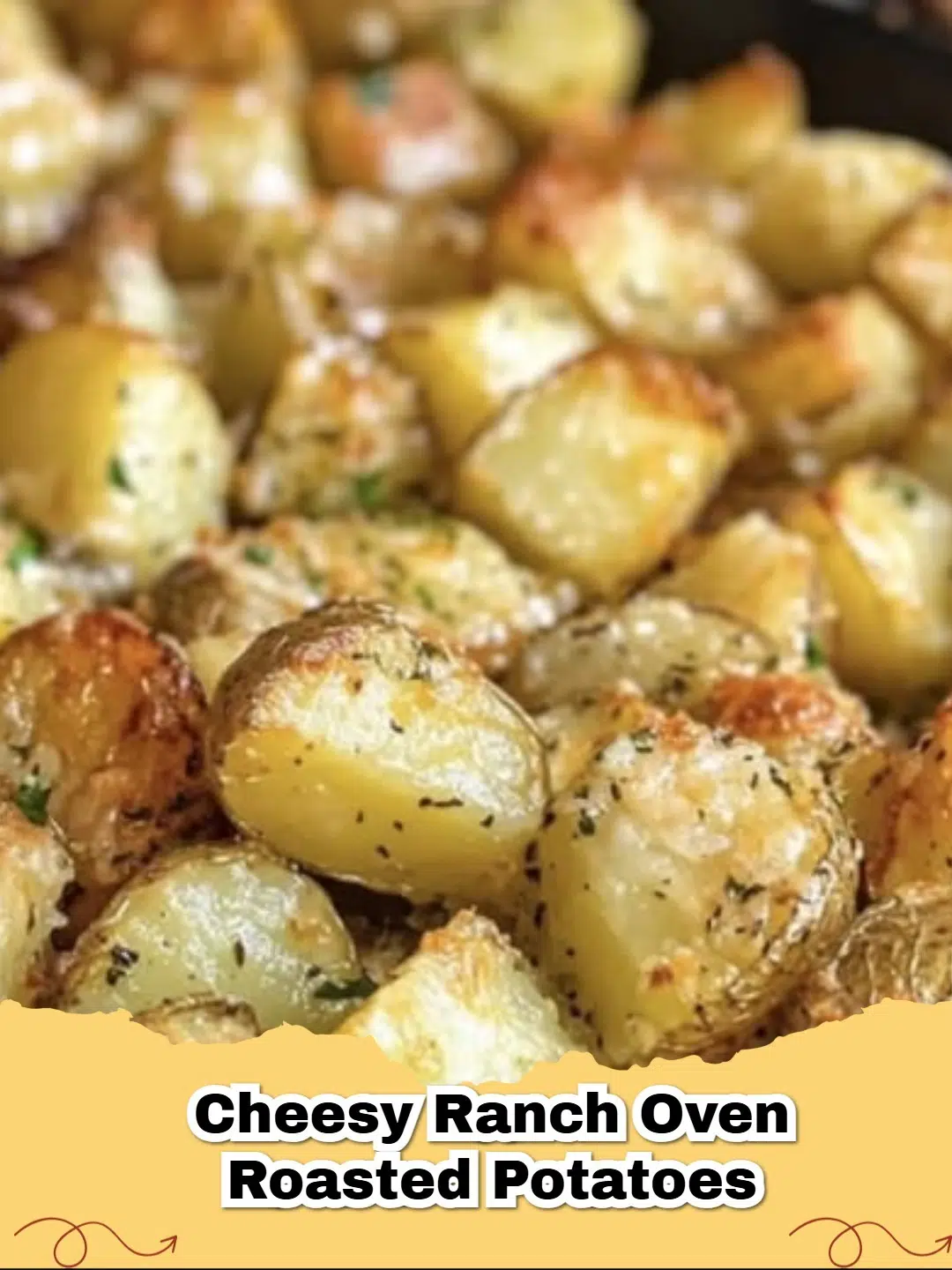 Cheesy Ranch Oven Roasted Potatoes, golden brown and perfectly seasoned on a baking sheet.