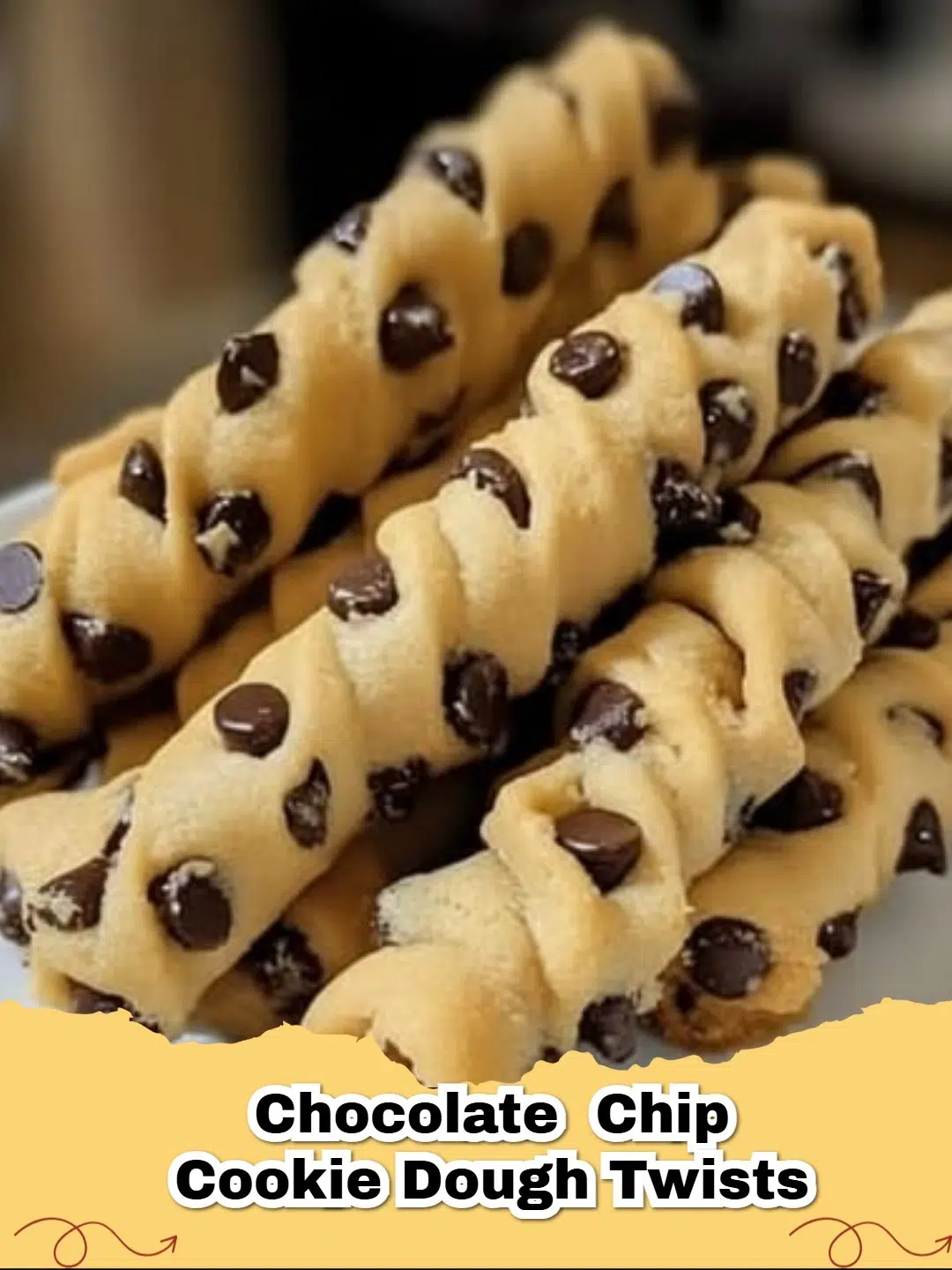 Delicious golden brown Chocolate Chip Cookie Dough Twists on a baking sheet.