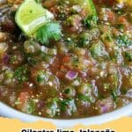 Fresh Cilantro-Lime Jalapeño Salsa in a bowl with tortilla chips, perfect for dipping.