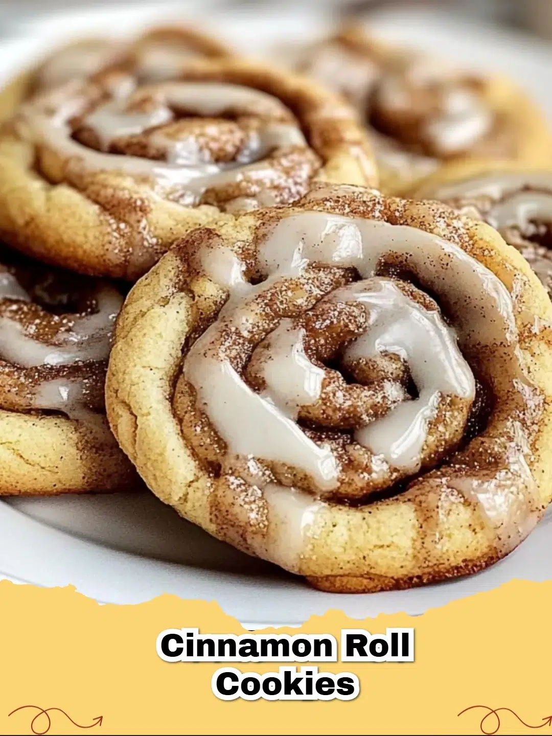 Delicious homemade cinnamon roll cookies with sweet swirls on a cooling rack.