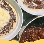 A warm bowl of creamy Filipino Champorado drizzled with milk, garnished for breakfast.