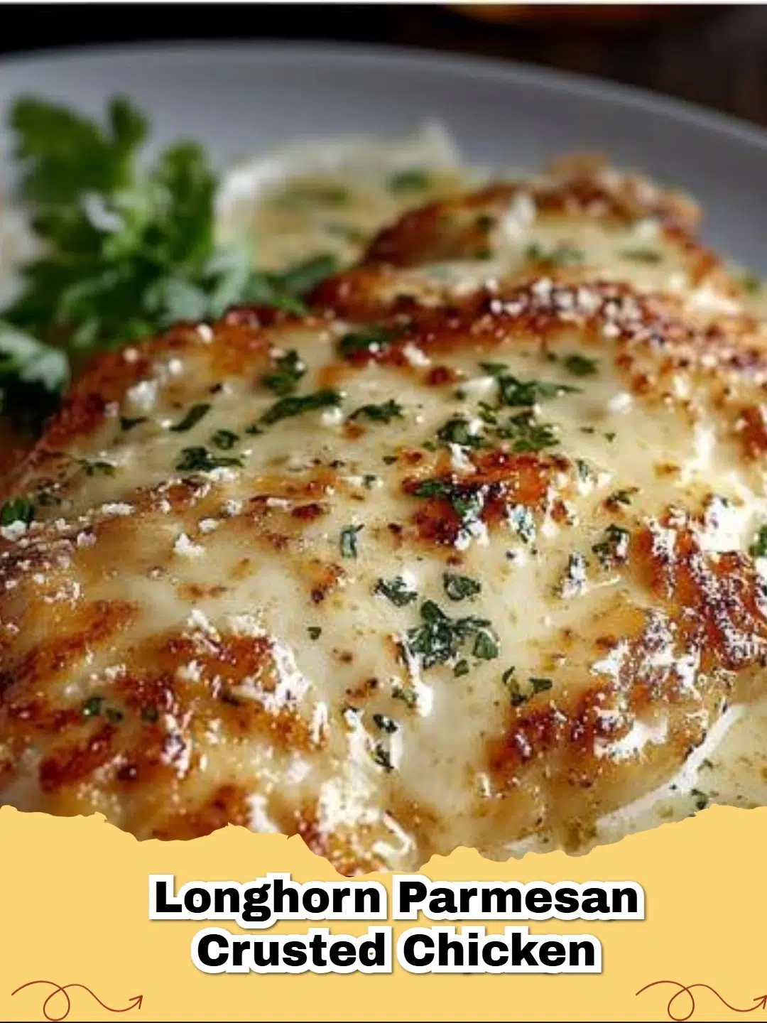 Golden brown Copycat Longhorn Parmesan Crusted Chicken topped with melted cheese sauce, served with green beans.