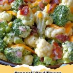 A bowl of creamy bacon broccoli cauliflower salad on a wooden table, garnished with fresh parsley.