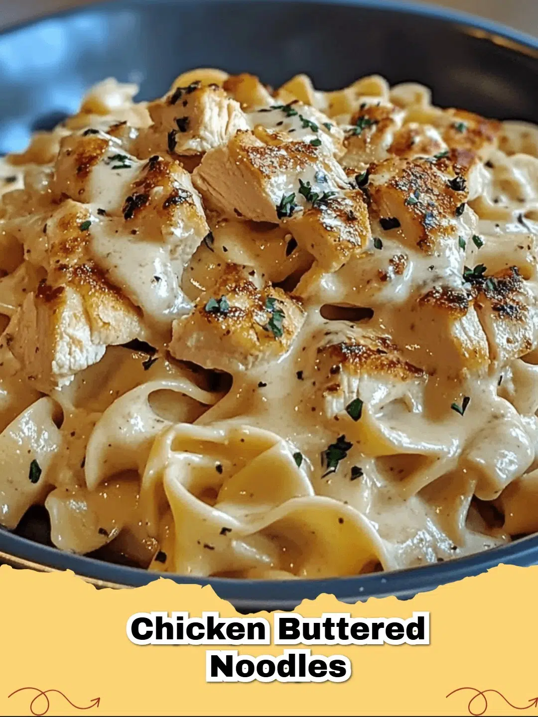 Close-up of a serving of creamy Chicken Buttered Noodles with fresh parsley garnish