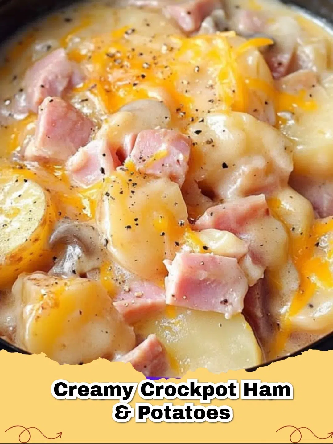 A close-up of a bowl filled with creamy crockpot ham and potatoes, garnished with fresh parsley.